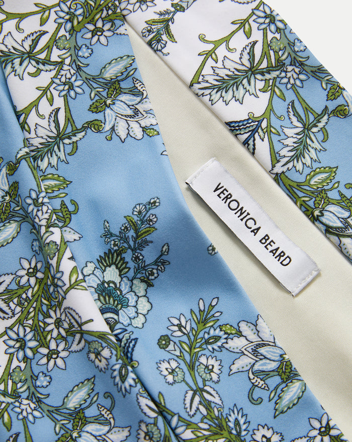 Veronica Beard Blue and white floral print silk scarf with a "VERONICA BEARD" label.