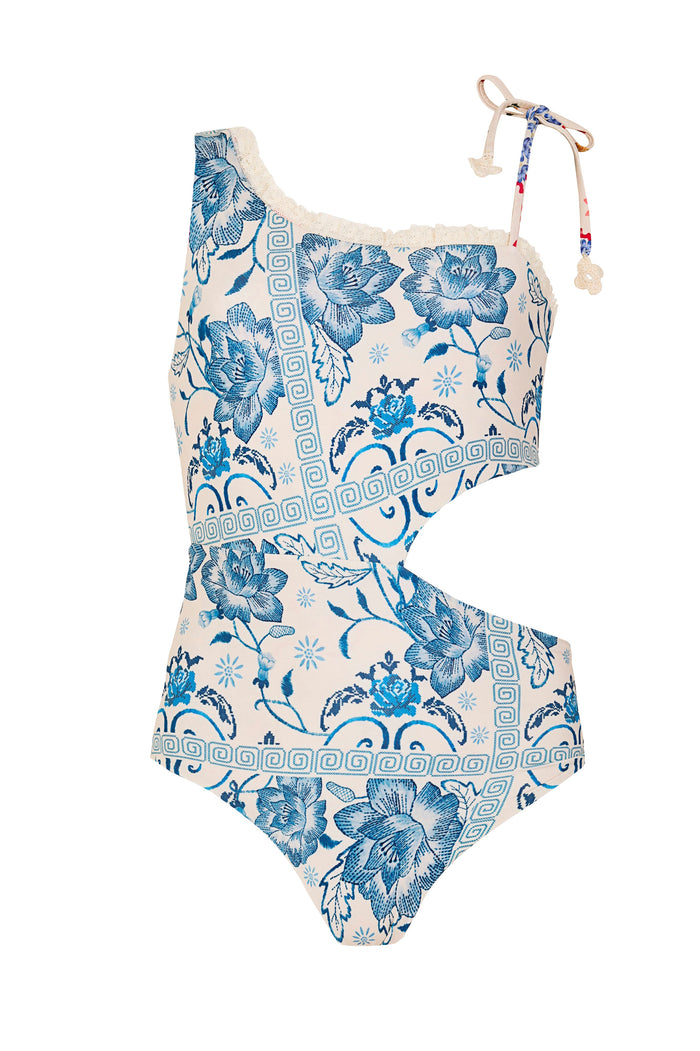 Blue pattern detail print one-piece swimsuit with asymmetric cutout detail, Greek key trim, and adjustable tie strap on cream base
