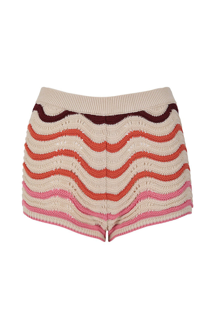 Knit shorts with horizontal wavy stripe pattern in beige, burgundy, coral, and pink tones