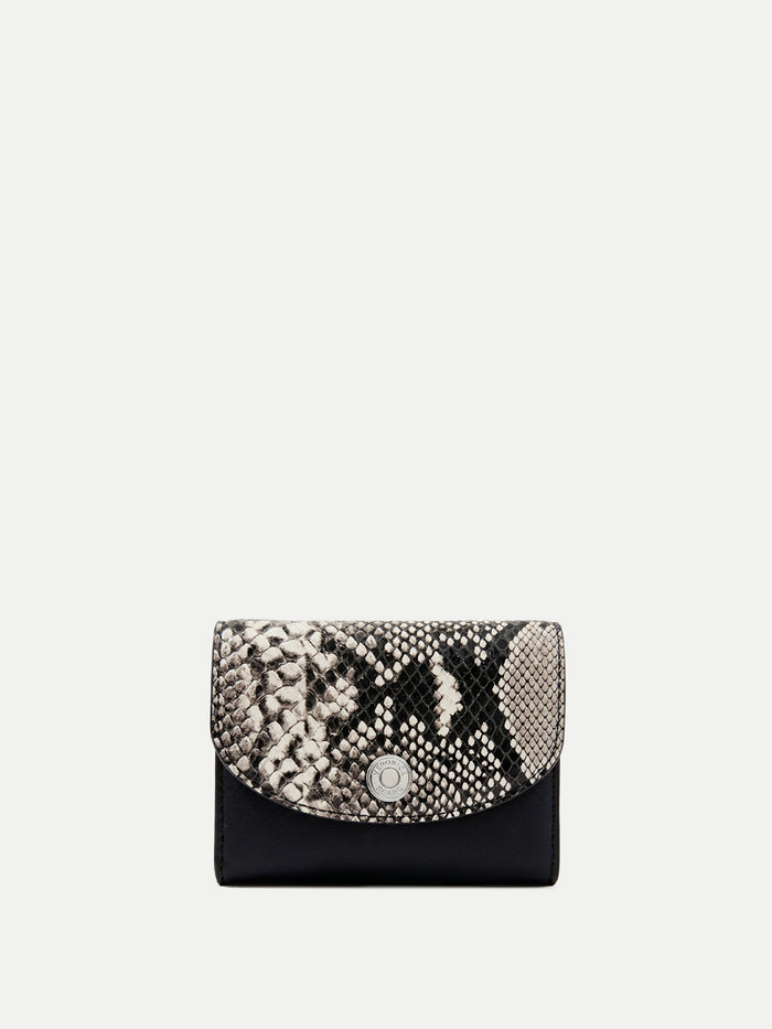 Veronica Beard Black and white snakeskin print wallet with a snap closure.