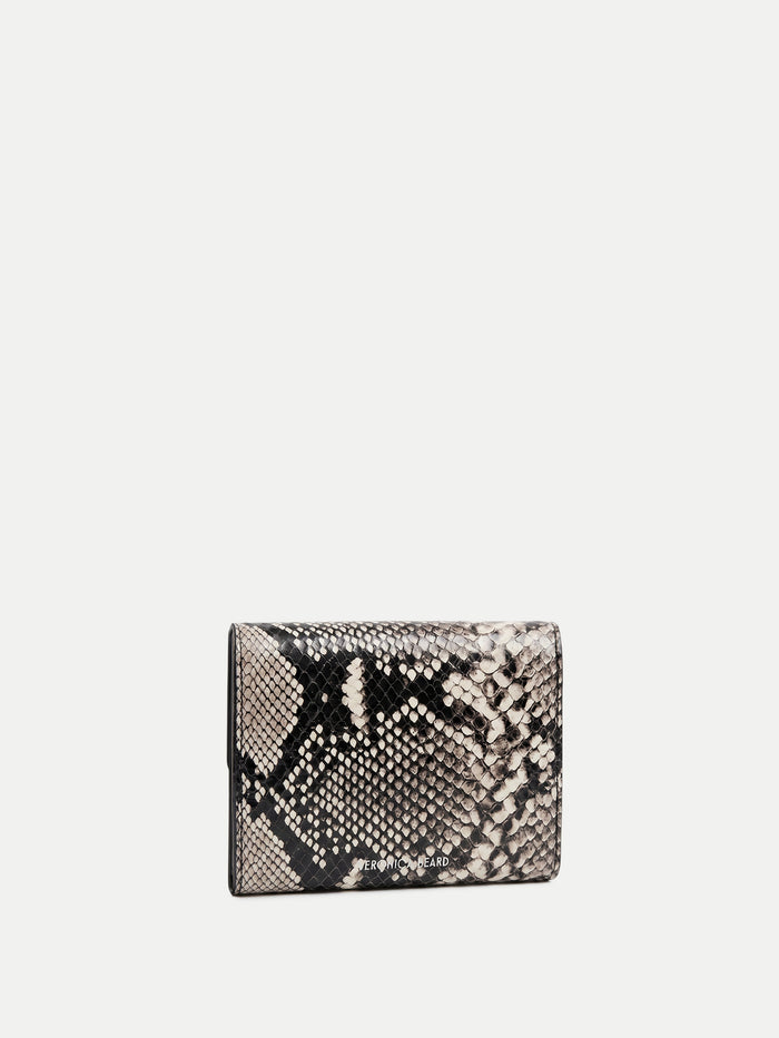 Veronica Beard Black and white snakeskin print wallet with "VERONICA BEARD" logo.