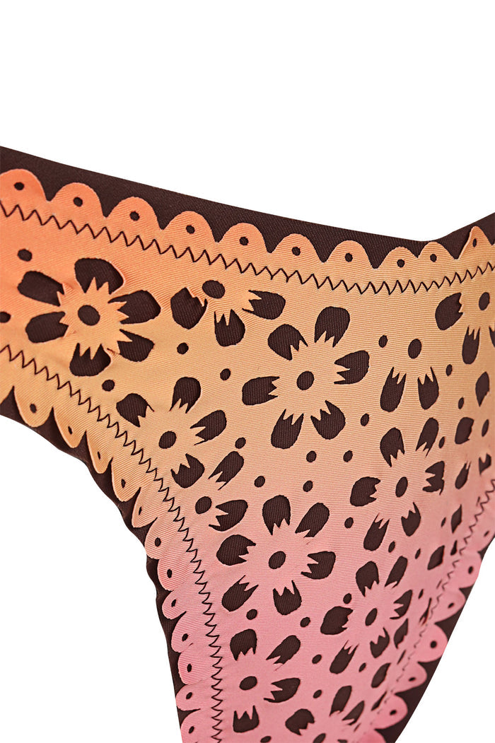 Tabita bikini bottom in gradient pink to peach with brown spotted print, scalloped laser-cut trim at waistband and edges