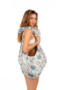 Tali Bag in cream with blue pattern detail and ornamental print, knotted top handle and relaxed slouchy silhouette