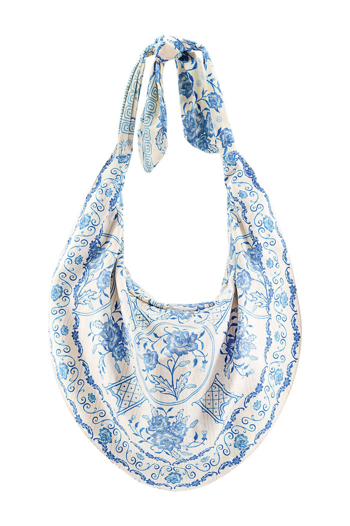 Tali Bag in cream with blue pattern detail scroll print, knotted shoulder straps, and geometric border detail
