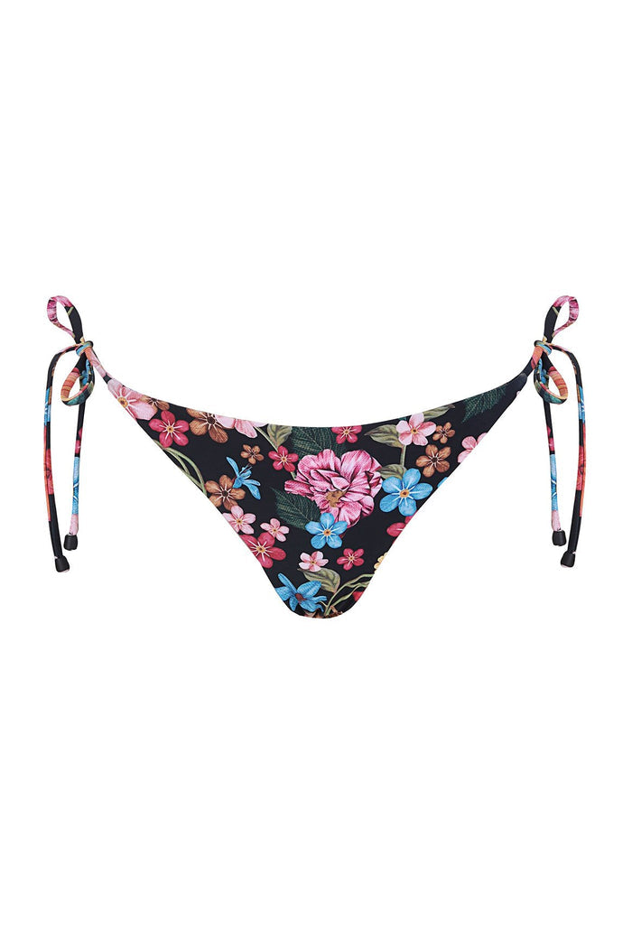 Tammy bikini bottom with adjustable side ties in black fabric featuring pink, blue, and coral pattern detail print