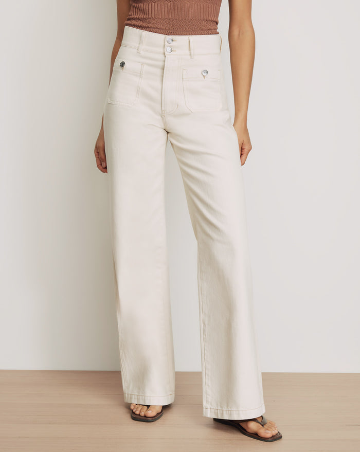 Veronica Beard Ecru wide-leg jeans with patch pockets.