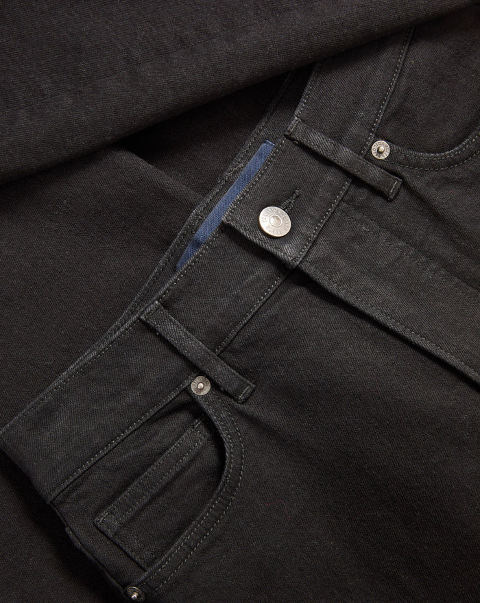 Veronica Beard Black denim jeans with silver button and rivets.
