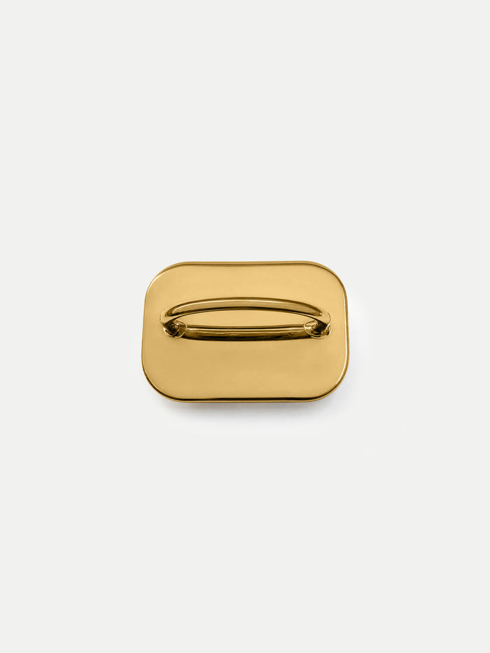 Veronica Beard Gold-tone rectangular metal handbag clasp.