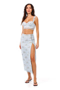 Light blue midi skirt with pattern detail print, high side slit, button closures, and lace trim detailing