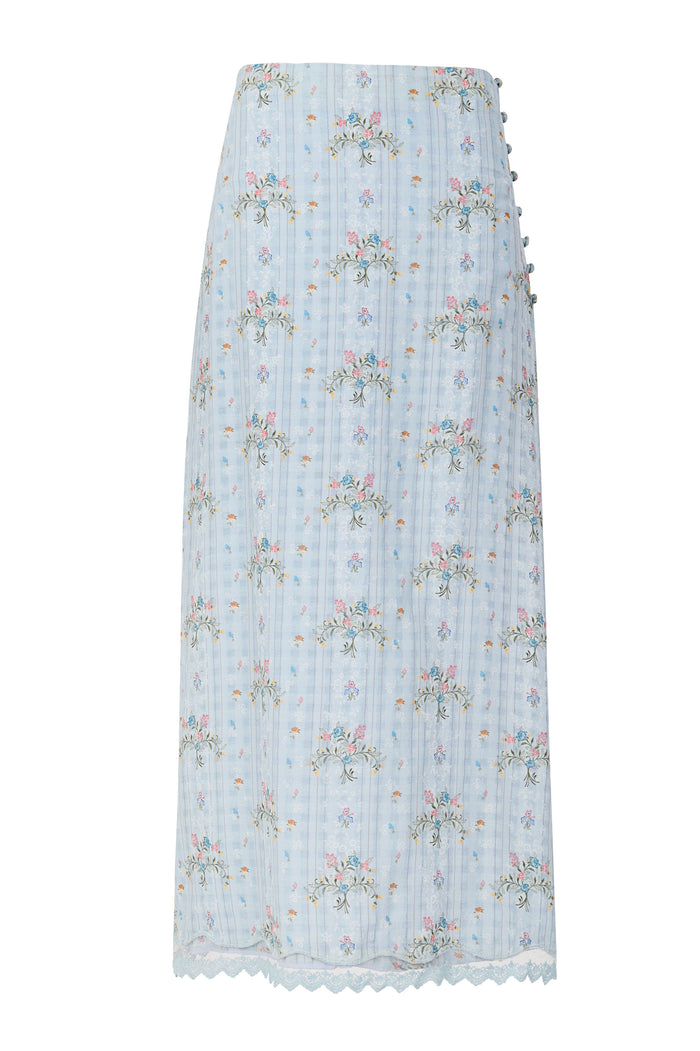 Light blue midi skirt with pattern detail embroidery, vertical stripes, side button closures, and lace hem trim