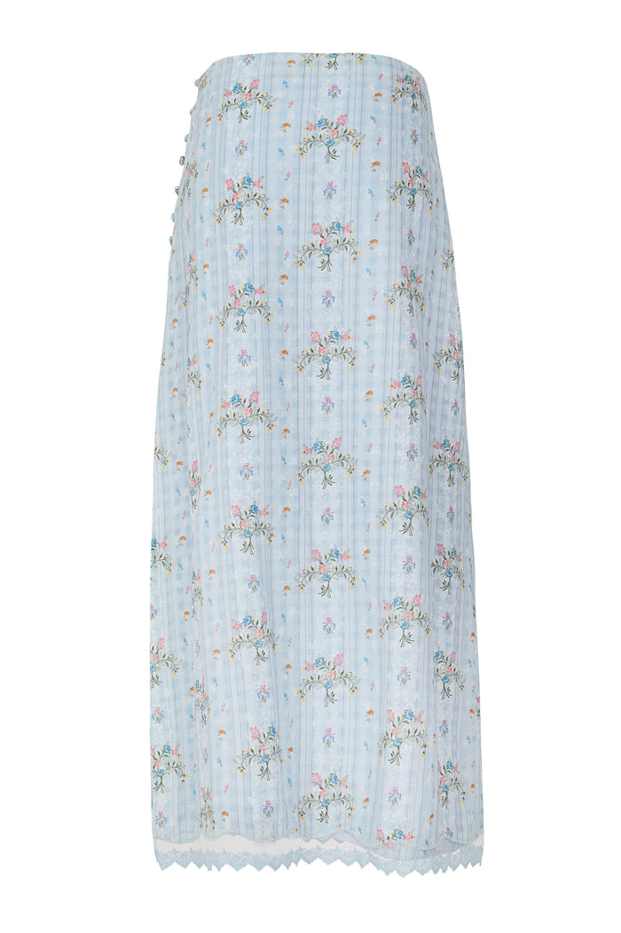 Light blue midi skirt with vertical pleats, scattered pattern detail embroidery in pink, blue and orange, side button details and scalloped lace hem
