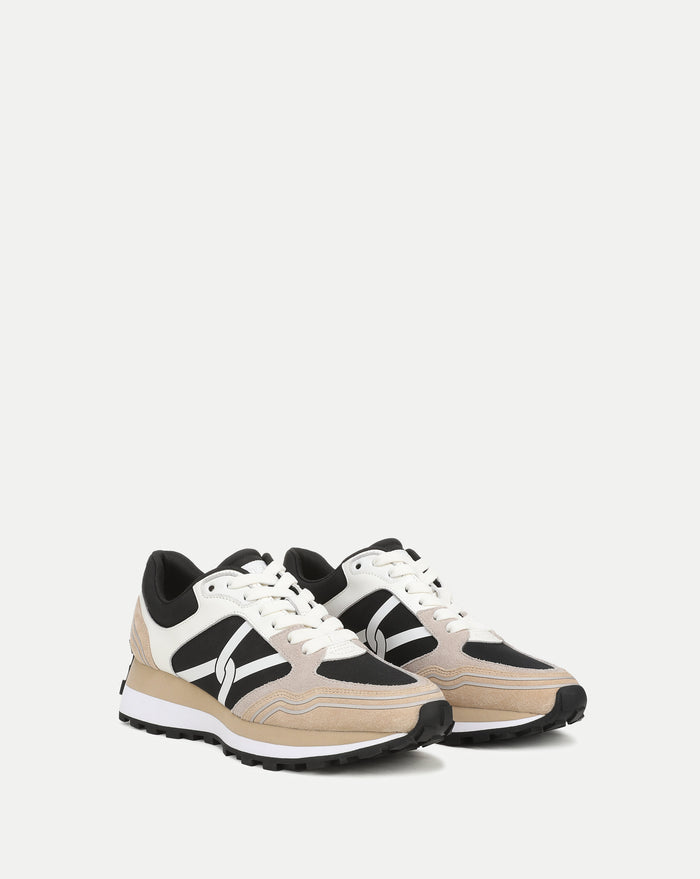Veronica Beard Beige and black sneakers with white soles.