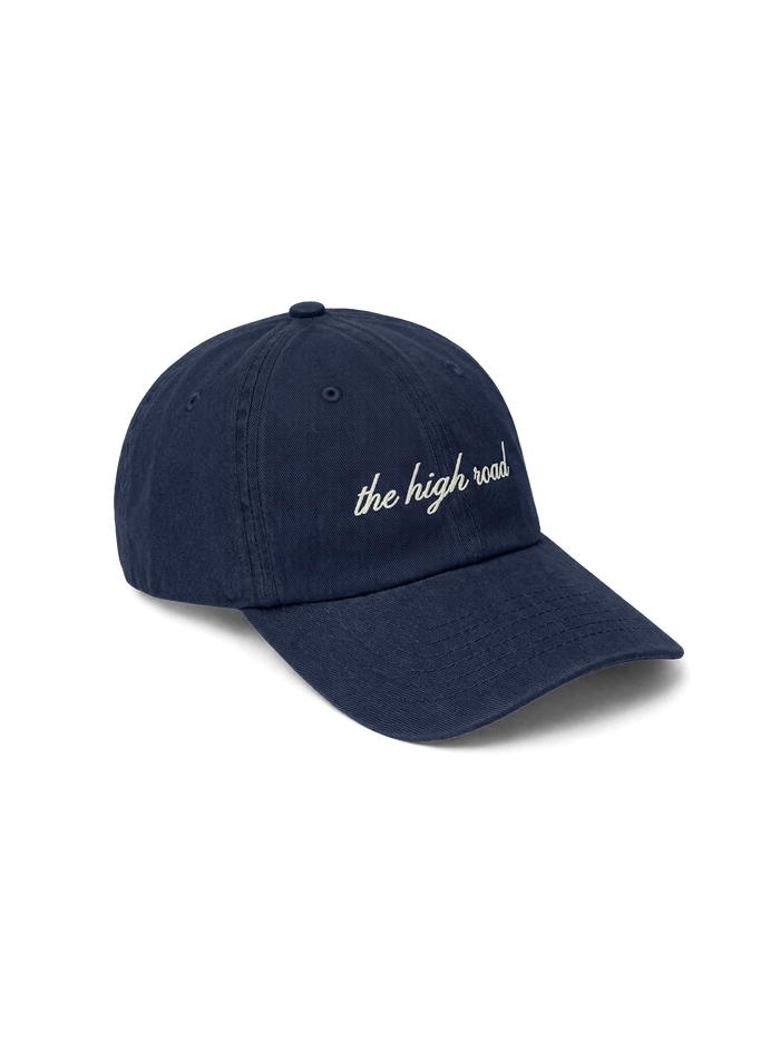 Veronica Beard Dark blue baseball cap with white cursive text.