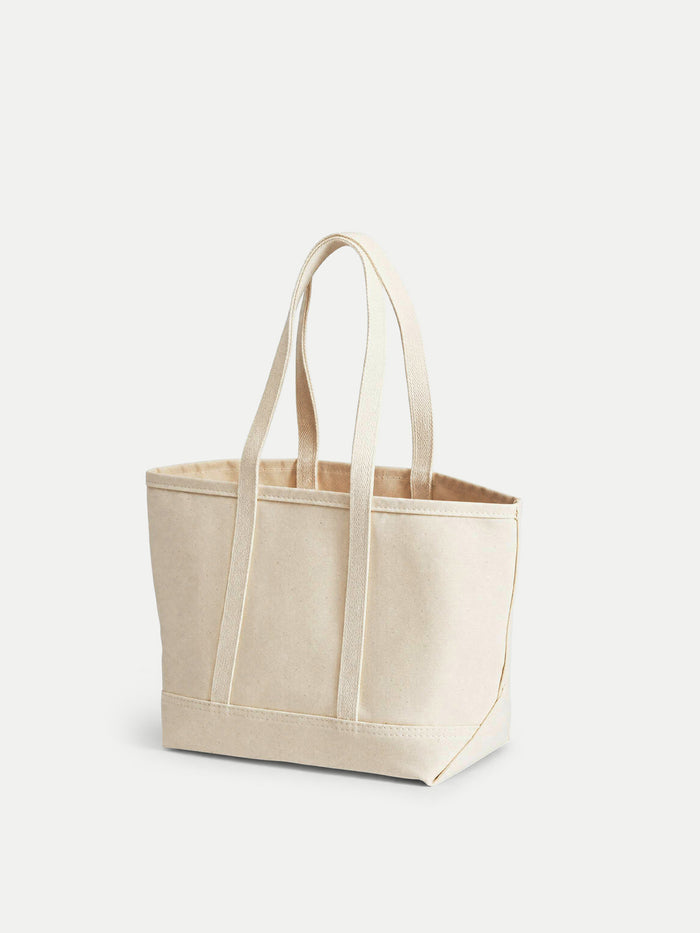 Veronica Beard Beige canvas tote bag with reinforced handles.