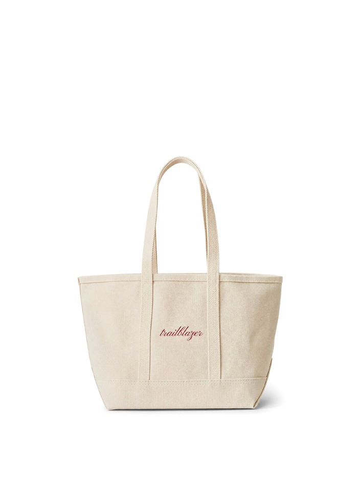 Veronica Beard Off-white canvas tote bag with red script.