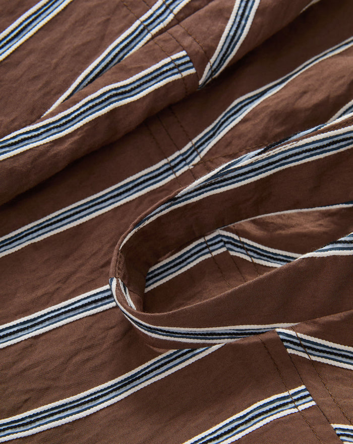Veronica Beard Brown and white striped linen crop top with a sweetheart neckline and matching brown linen shorts.