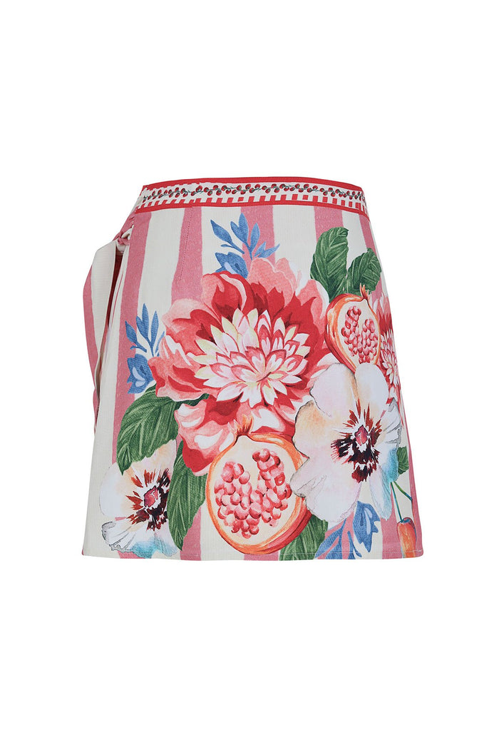 Wrap skirt with pink striped background, vibrant pattern detail print featuring lotus blooms, pomegranates, blue leaves, and tropical foliage, decora…