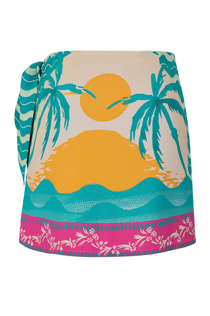 Ziara wrap skirt with teal palm trees, golden sun and waves on cream background, pink border with botanical print and striped side panel