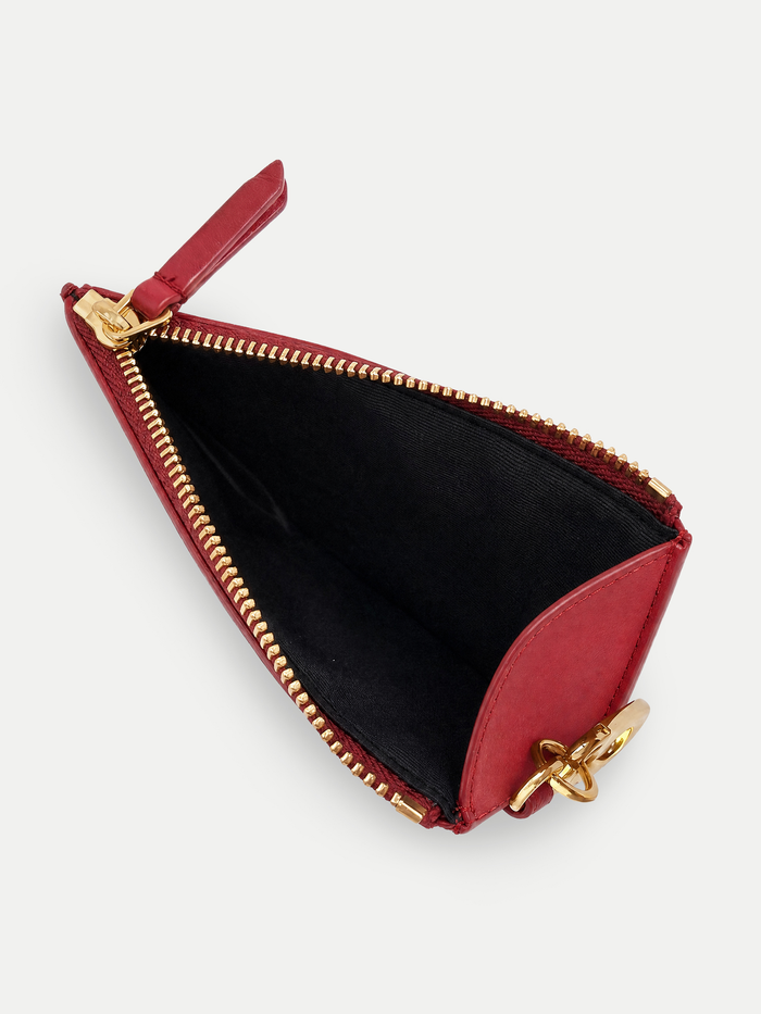 Veronica Beard Red leather zip pouch with gold hardware.
