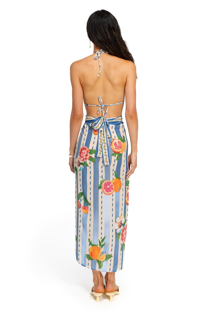 Zinna pareo cover-up with blue and cream striped print featuring citrus slices and pattern detail details, back view showing halter tie and waist wra…